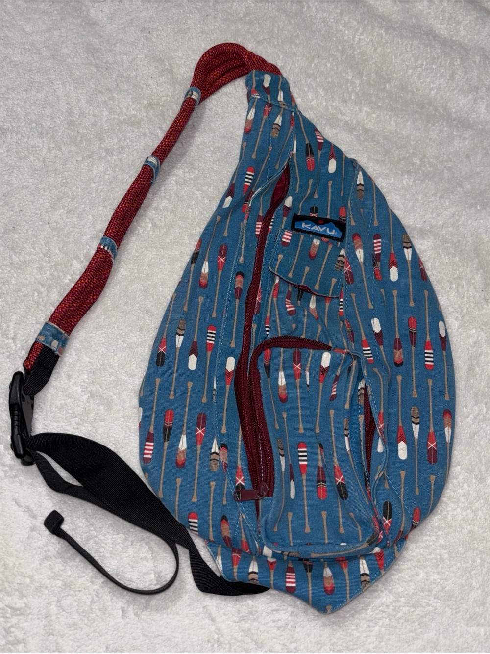 KAVU Slingback Blue Paddle Oar Print Multiple Zip Pockets Adjustable Rope Strap